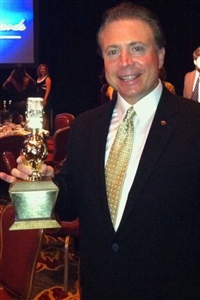 Receiving the Golden Mike for Best Consumer and Business News Reporting January 2012